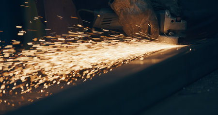 Grinding Metal Sparks Steel Cutting At Industrial Workshopの写真素材
