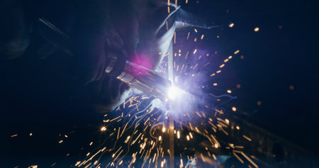 Welding Metal Parts At Steel Construction Industrial Workshopの写真素材