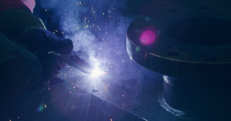 Welding Metal Parts At Steel Construction Industrial Workshopの写真素材