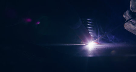 Welding Metal Parts At Steel Construction Industrial Workshopの写真素材