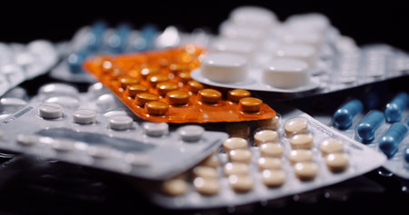 Various Medical Pills Drugs Black Background Pharmaceutical Industry. Painkillers Rotating.の写真素材