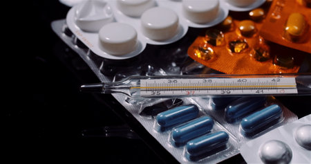 Various Medical Pills Drugs Black Background Pharmaceutical Industry. Painkillers Rotating.の写真素材