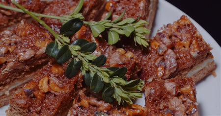 Traditional Walnut Cake on Plate Rotating.の写真素材