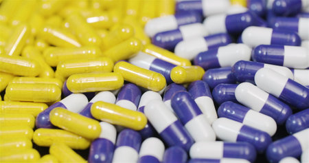 Medical tablets and pills rotating, pharmaceutical industry.の写真素材