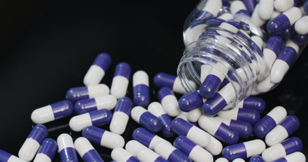 Medical tablets and pills rotating, pharmaceutical industry.の写真素材