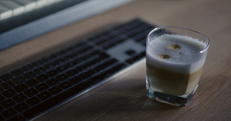 Coffee latte on desk waiting for office worker