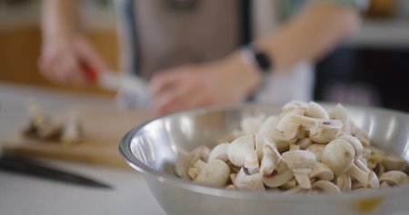 Chef Preparing a Dish with Mushroomsの写真素材