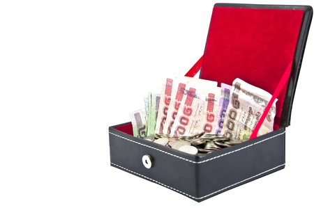 thai banknote and coin in box on white backgroundの写真素材