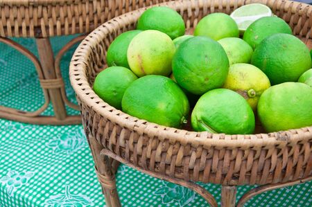 raw lime green on ratten basketの写真素材