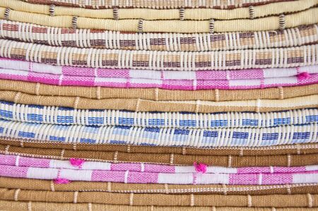 colorfull and heap of thai style native cotton clothingの写真素材