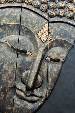 detail and pattern by handcraft with white face of Buddhaの写真素材