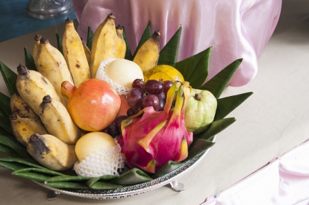 Group of thai style fruit on banana leafの写真素材