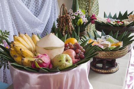 Group of thai style fruit and dessert on banana leafの写真素材