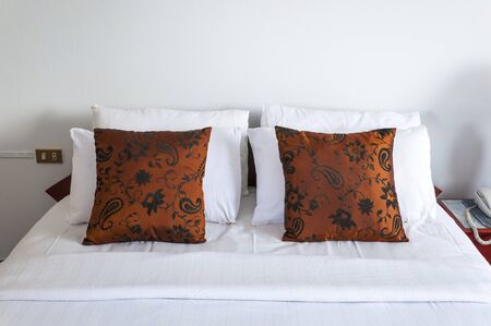 Bedroom interior with double brown pillowsの写真素材