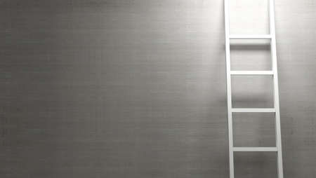 ladder lit by spotlight on concrete backgroundの写真素材