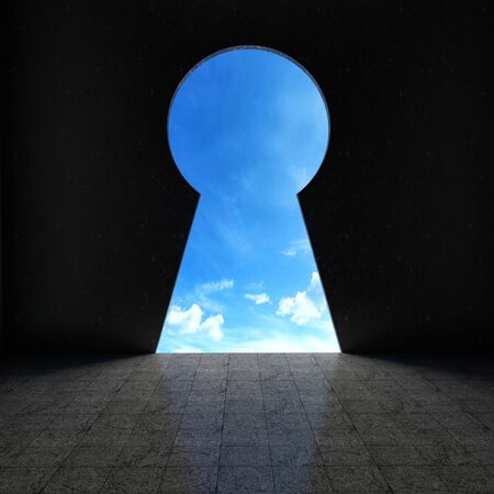 Keyhole looking out into blue skyの写真素材