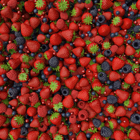 mix of fresh berries with green leavesの写真素材