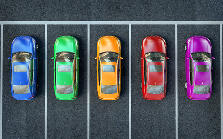 colored cars are in the parking lot or getting ready for raceの写真素材