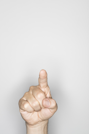 isolated male hand, photographed in the studioの写真素材