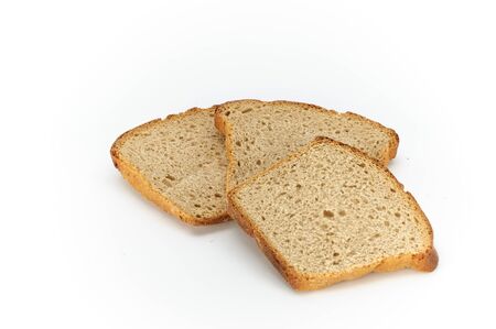 slices of wheat bread on a white background, studio photoの写真素材