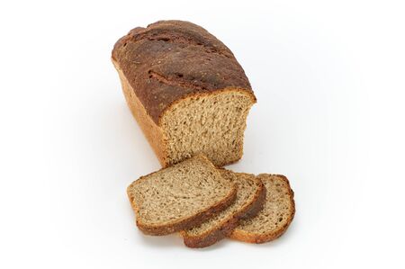 Traditional rural rye bread, sliced on a white background, studio photoの写真素材