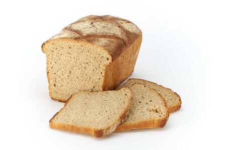 Traditional rural wheat bread, sliced on a white background, studio photoの写真素材
