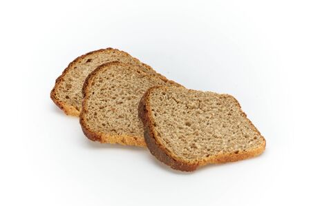 slices of rye bread on a white background, studio photoの写真素材