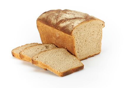 Traditional rural wheat bread, sliced on a white background, studio photoの写真素材