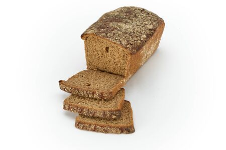 Traditional rural Graham bread, sliced, isolated on a white background, studio photo
