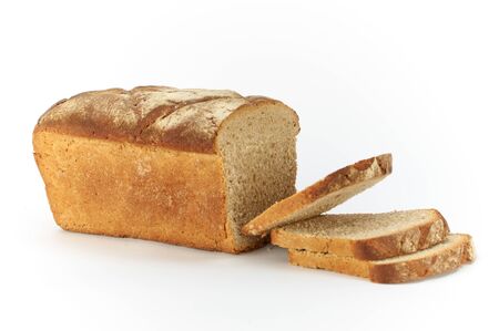 Traditional rural wheat bread, sliced on a white background, studio photoの写真素材