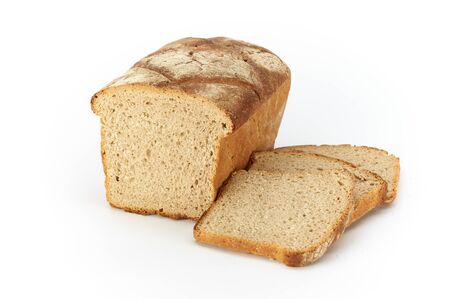 Traditional rural wheat bread, sliced on a white background, studio photoの写真素材