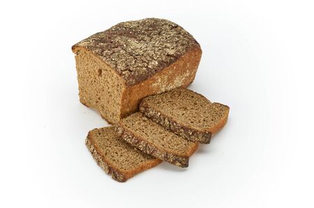 Traditional rural Graham bread, sliced, isolated on a white background, studio photoの写真素材