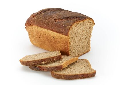 Traditional rural rye bread, sliced on a white background, studio photoの写真素材