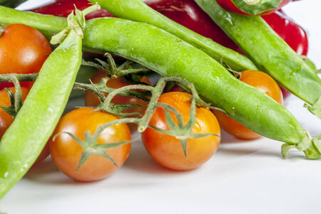 Detail of many vegetables on brown wood tableの写真素材
