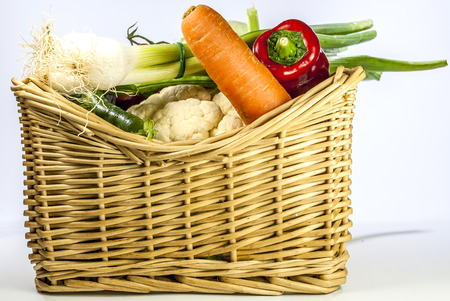 Detail of many vegetables on brown wood tableの写真素材