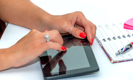 bussines woman working in office with tablet and pen
