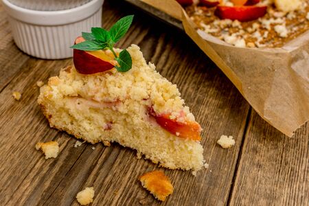 Fruit nectarine pie or dessert with leaf of mintの写真素材