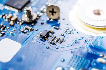 Blue electronic circuit board close up photography
