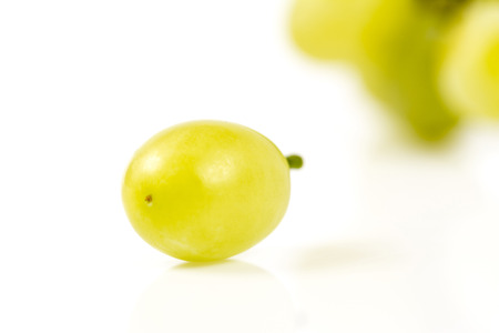 Fresh green grapes isolated on white background