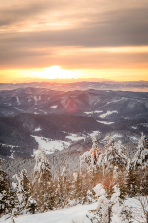 sunrise in winter snowy Czech mountains Beskydyの写真素材