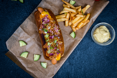 Grilled Hotdog with vegetables and french friesの写真素材