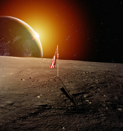USA flag on moon. Blue planet Earth and the Sun.の写真素材