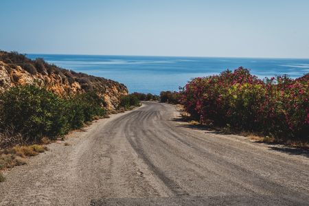 Road near Ocean beach  on the Crete in sunny dayの写真素材