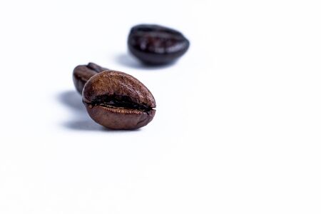 Roasted coffee bean isolated on white background with copy spaceの写真素材