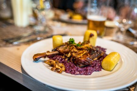 Czech traditional grilled duck with red cabbage and dumpling