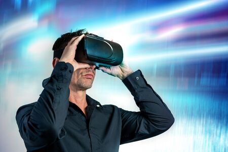 Male business  using black virtual reality headset glassesの写真素材
