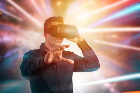 Male business  using black virtual reality headset glasses