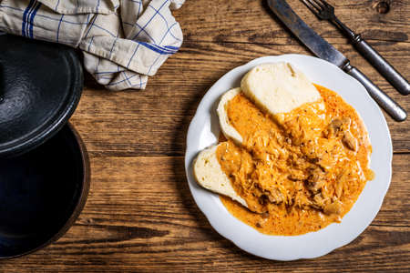 Traditional Szeged goulash with cabage, meat and czech dumplingの写真素材