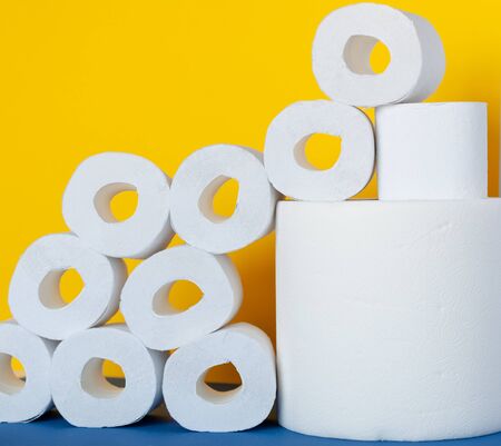 Rolls of toilet paper on color backgroundの写真素材