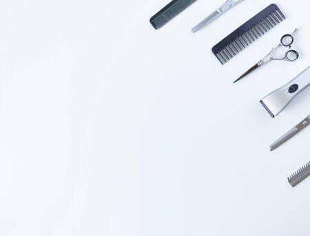 set for a hairdresser on a white background, place for an inscription, collection of hair styling salon tools isolated on white backgroundの写真素材